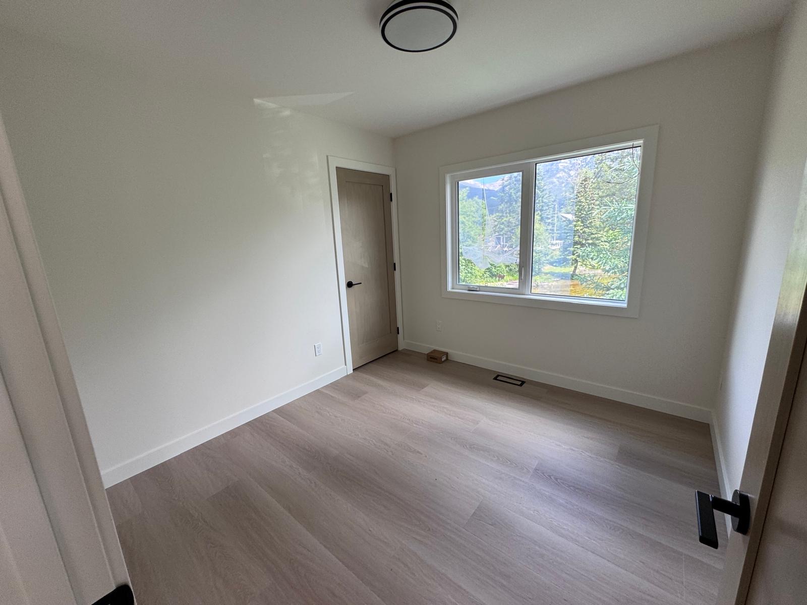 Private bedroom with mountain view window